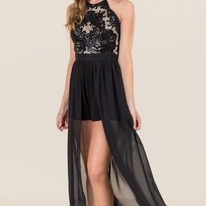 Black high low romper with sheer train